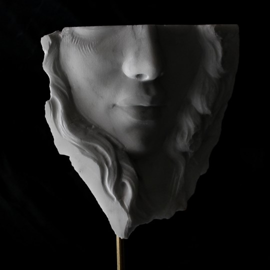 Volto in marmo arabescato di Carrara